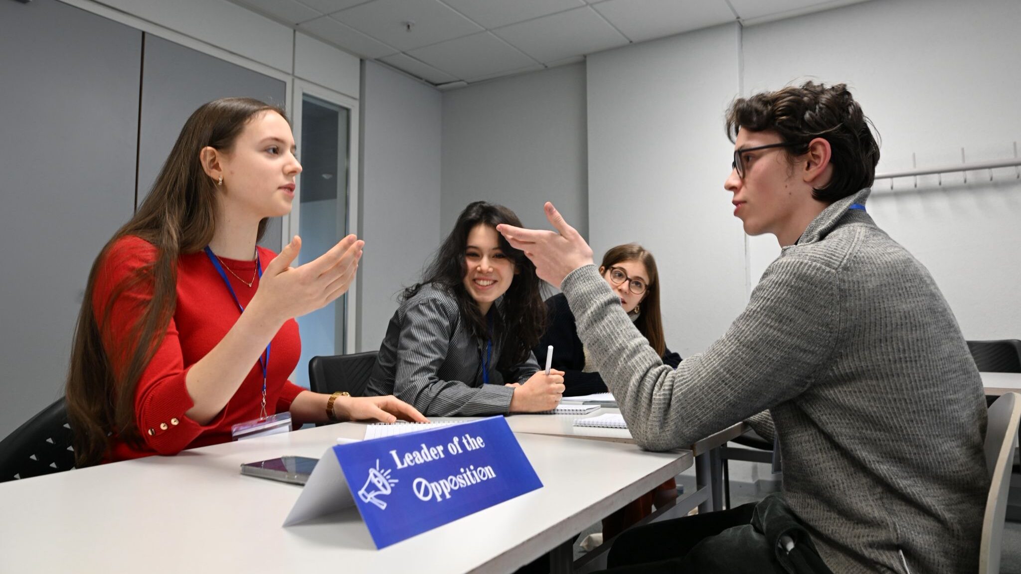 Debaters discussing a motion at the Oxford Debating Competition Switzerland